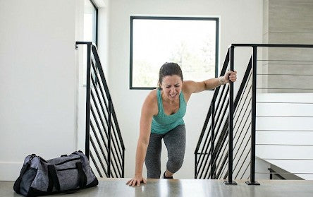Active appearing person crawling up the stairs after the gym.